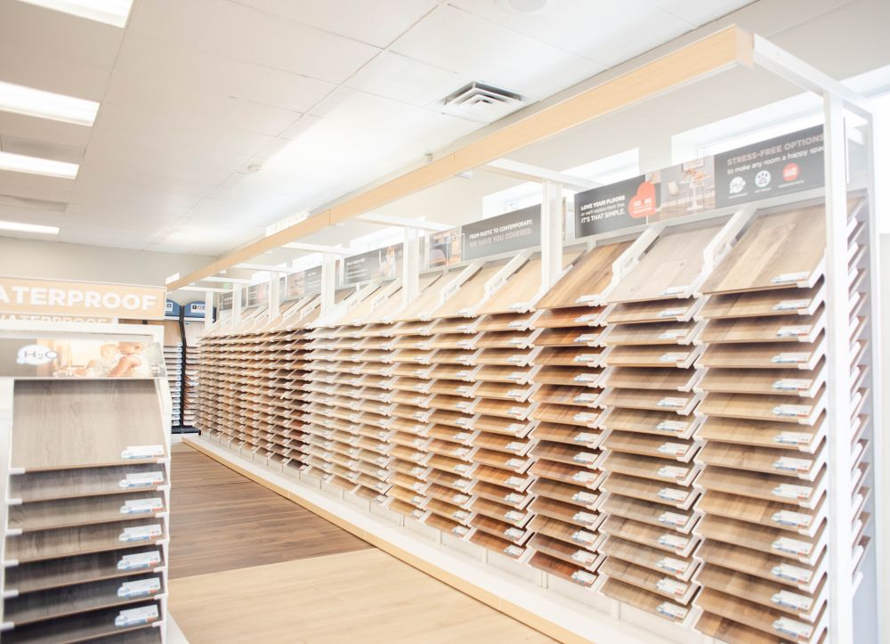 Flooring showroom in Brigham City UT featuring hardwood, carpet, tile, and luxury vinyl flooring displays